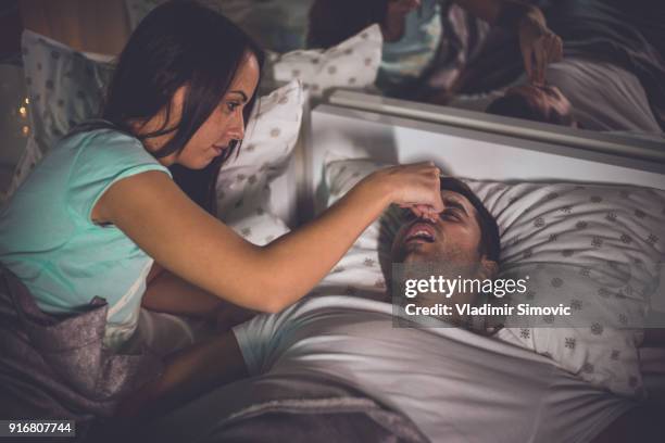 marital problems - snoring husband stock pictures, royalty-free photos & images