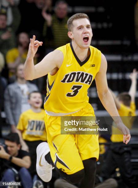 Guard Jordan Bohannon of the Iowa Hawkeyes celebrates a 3-pointer in the second half against the Michigan State Spartans on February 6, 2018 at...