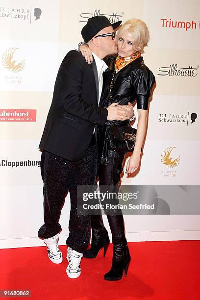 Armin Morbach and model Eva Padberg arrive for the 'Tribute To Bambi 2009' at the station on October 9, 2009 in Berlin, Germany.