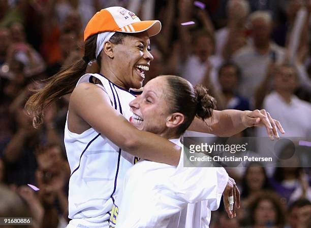 Tangela Smith and Diana Taurasi of the Phoenix Mercury celebrate after defeating the Indiana Fever in Game Five of the 2009 WNBA Finals at US Airways...