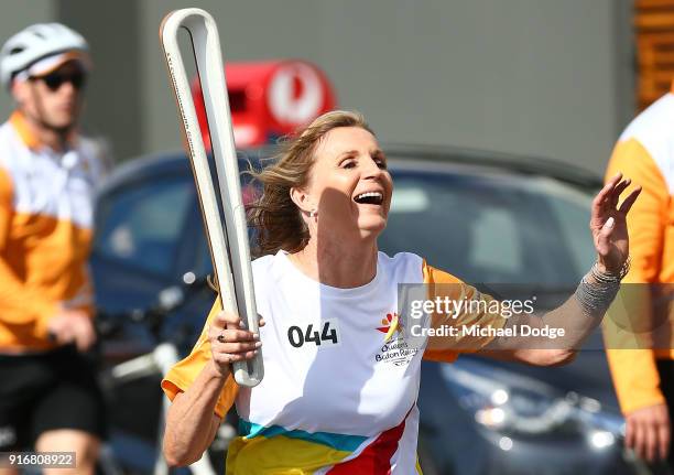 400m Hurdles Olympic Gold Medallist Debbie Flintoff-King carries the Queens Baton during the Queens Baton Commonwealth Games relay in Frankston on...