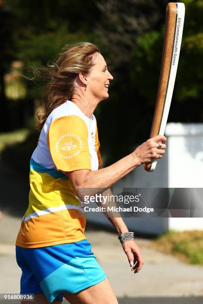 400m Hurdles Olympic Gold Medallist Debbie Flintoff-King carries the Queens Baton during the Queens Baton Commonwealth Games relay in Frankston on...