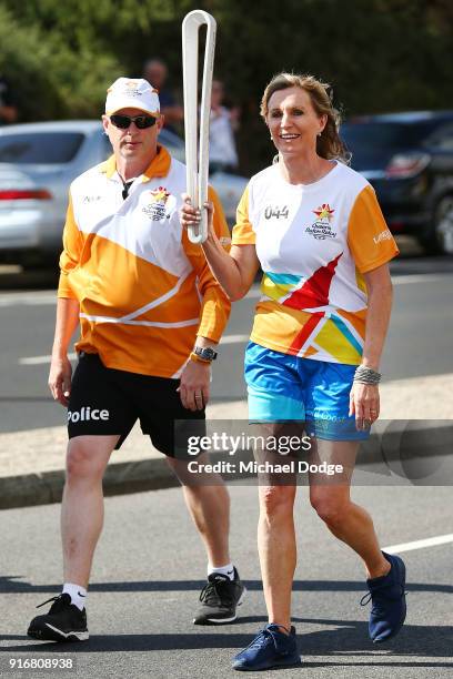 400m Hurdles Olympic Gold Medallist Debbie Flintoff-King carries the Queens Baton during the Queens Baton Commonwealth Games relay in Frankston on...