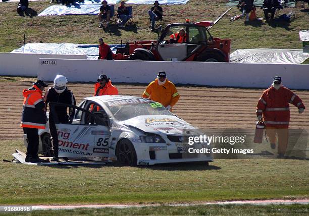 In this handout image provided by Australian V8 Ute Racing, Allan Letcher driver of the United Forklifts WIlliams Rac Allan Letcher Team emerges from...