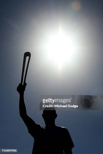 Darren Murphy carries the Queens Baton during the Queens Baton Commonwealth Games relay in Frankston on February 11, 2018 in Melbourne, Australia.