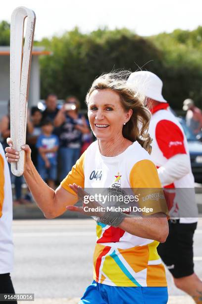 400m Hurdles Olympic Gold Medallist Debbie Flintoff-King carries the Queens Baton during the Queens Baton Commonwealth Games relay in Frankston on...