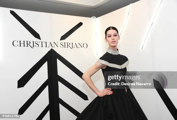 Model Avie Acosta poses backstage for the Christian Siriano fashion show during New York Fashion Week at the Grand Lodge on February 10, 2018 in New...