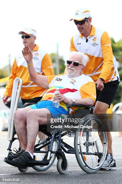 Mt.Martha Cricket club founder and legend Ray Peak carries the Queens Baton during the Queens Baton Commonwealth Games relay in Frankston on February...