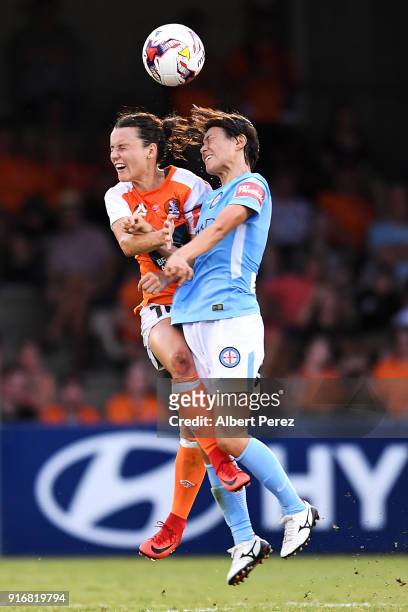 Hayley Raso of the Roar and Yukari Kinga of Melbourne City compete for the ball during the W-League Semi Final match between the Brisbane Roar and...