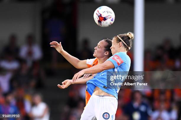Abbey Lloyd of the Roar and Aivi Luik of Melbourne City compete for the ball during the W-League Semi Final match between the Brisbane Roar and...