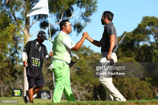 Kiradech Aphibarnrat of Thailand shakes hands with James Nitties of Australia after winning the final match during day four of the World Super 6 at...