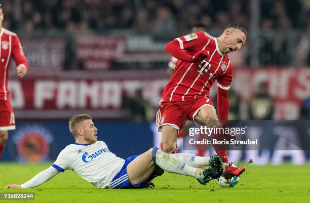 Max Meyer of FC Schalke 04 tackles Franck Ribery of FC Bayern Muenchen during the Bundesliga match between FC Bayern Muenchen and FC Schalke 04 at...