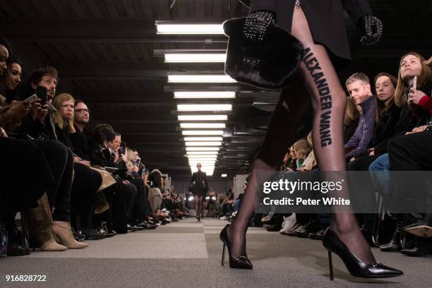 Chunjie Liu, legs detail, walks the runway at Alexander Wang Fashion Show during New York Fashion Week at 4 Times Square on February 10, 2018 in New...