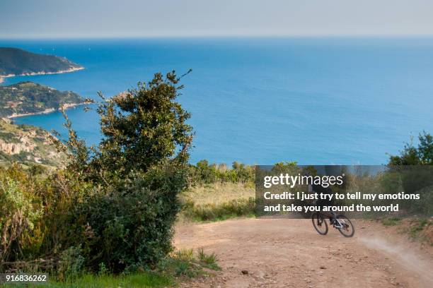 the cliffs of monte argentario in italy, tuscany - オルベテッロ ストックフォトと画像