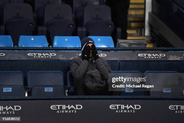 Riyad Mahrez of Leicester City looks on from the bench during the Premier League match between Manchester City and Leicester City at Etihad Stadium...