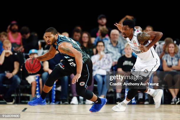 Devonte DJ Newbill of the Breakers competes against Carrick Felix of United during the round 18 NBL match between the New Zealand Breakers and...