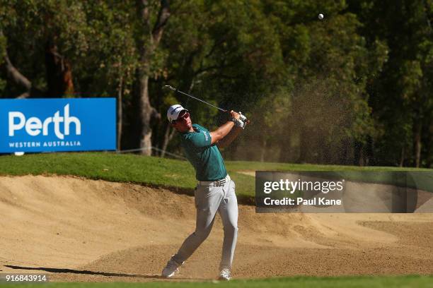 Lucas Herbert of Australia plays out from a green side bunker in the semi final match against Kiradech Aphibarnrat of Thailand during day four of the...
