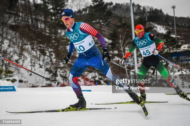 Patrick Caldwell of United States and Yury Astapenka of Belarus at Men's 15km + 15km Skiathlon at olympics at Alpensia cross country stadium,...