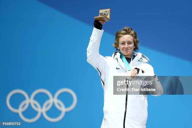 Gold medalist Redmond Gerard of the United States celebrates on the podium during the Medal Ceremony for the Men's Snowboard Slopestyle on day two of...