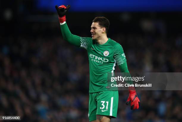 Ederson Moraes of Manchester City celebrates his teams first goal during the Premier League match between Manchester City and Leicester City at...