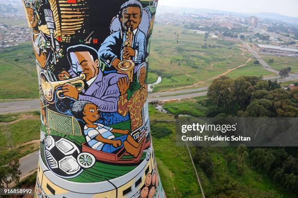 Mural painting and graffitis on the Orlando Towers, built for the Orlando decommissioned coal fired Power Station. Orlando is a township in the urban...