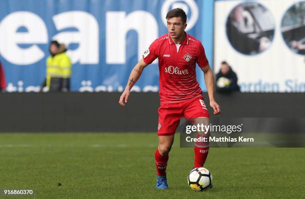 Kai Wagner of Wuerzburg runs with the ball during the 3. Liga match between F.C. Hansa Rostock and FC Wuerzburger Kickers at Ostseestadion on...