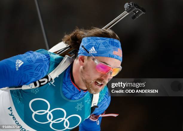 S Sean Doherty competes in the men's 10km sprint biathlon event during the Pyeongchang 2018 Winter Olympic Games on February 11 in Pyeongchang. / AFP...