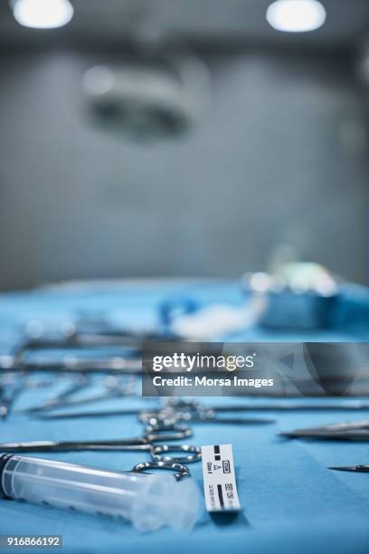 close-up of surgical instruments on medical tray - surgical tray stock pictures, royalty-free photos & images