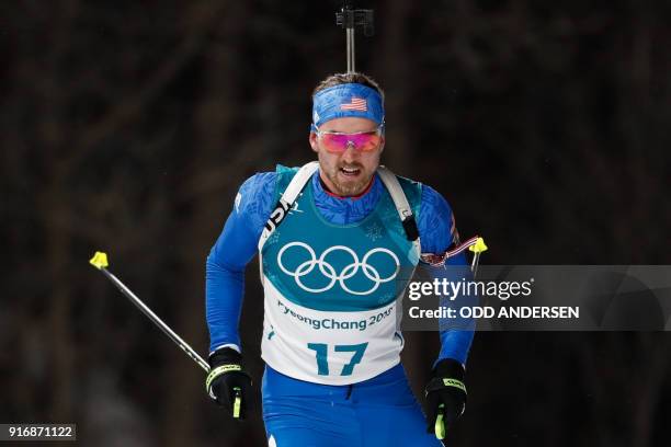 S Sean Doherty competes in the men's 10km sprint biathlon event during the Pyeongchang 2018 Winter Olympic Games on February 11 in Pyeongchang. / AFP...