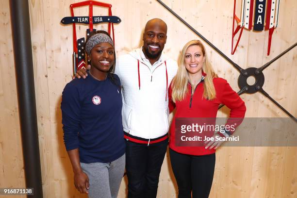 Aja Evans, NFL Player Vernon Davis and Jamie Greubel-Posner pose for a photo at the USA House at the PyeongChang 2018 Winter Olympic Games on...