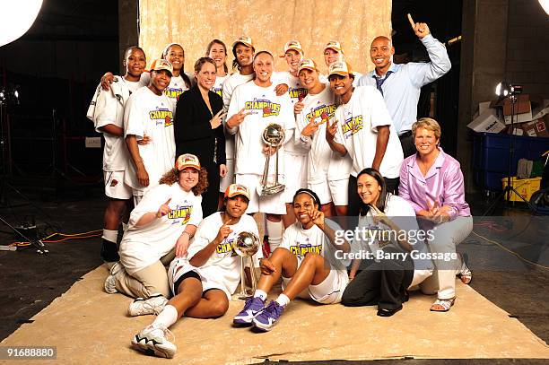 The Phoenix Mercury celebrate their WNBA Championship after defeating the Indiana Fever 94-86 in Game five of the WNBA Finals played on October 9,...