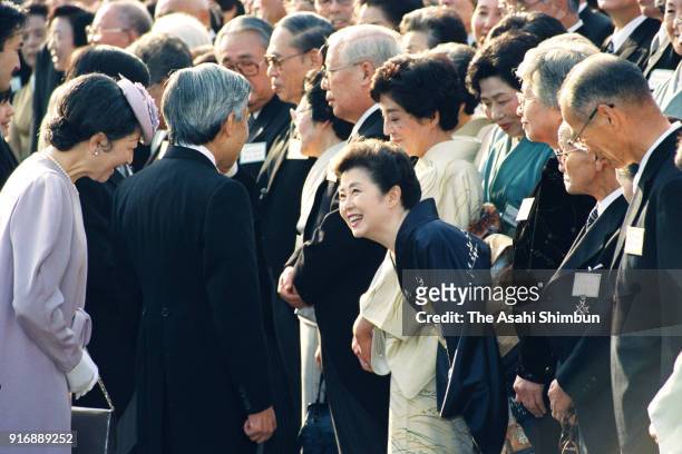 Emperor Akihito and Empress Michiko talk to actress Mitsuko Mori during the Autumn Garden Party at the Akasaka Imperial Garden on November 7, 1991 in...
