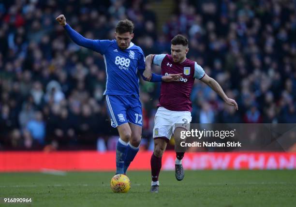 Scott Hogan of Aston Villa and Harlee Dean of Birmingham City in action during the Sky Bet Championship match between Aston Villa and Birmingham City...