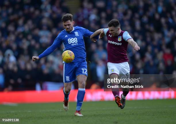 Scott Hogan of Aston Villa and Harlee Dean of Birmingham City in action during the Sky Bet Championship match between Aston Villa and Birmingham City...