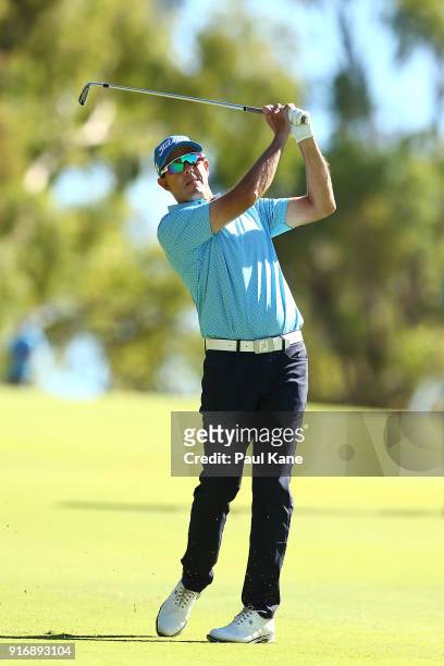 Stephen Leaney of Australia plays his second shot on the third hole in his match against Andrea Pavan of Italy during day four of the World Super 6...