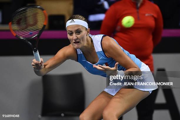 France's Kristina Mladenovic returns to Belgium's Elise Mertens during the Tennis Fed Cup world group first round match between France and Belgium in...