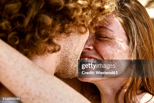 Happy young couple hugging Happy young couple hugging