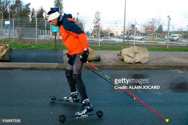 Moroccan cross-country skier Samir Azzimani trains for the Pyeongchang 2018 Winter Olympic Games near the Peripherique boulevard on February 1 in...