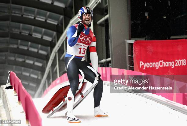 Chris Mazdzer of the United States celebrates winning the silver medal following run 4 during the Luge Men's Singles on day two of the PyeongChang...