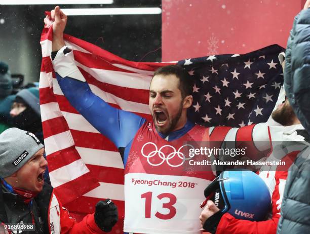 Chris Mazdzer of the United States celebrates winning the silver medal following run 4 during the Luge Men's Singles on day two of the PyeongChang...