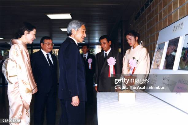 Emperor Akihito and Empress Michiko attend the national agriculture award ceremony at the Imperial Palace on November 25, 1991 in Tokyo, Japan.