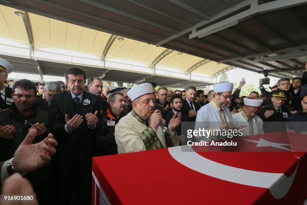 Turkish Economy Minister Nihat Zeybekci attends funeral ceremony of Staff Captain Pilot Mehmet Ilker Karaman who was martyred during Turkey's...