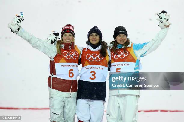 Silver medalist Justine Dufour-Lapointe of Canada, gold medalist Perrine Laffont of France and bronze medalist Yulia Galysheva of Kazakhstan pose...