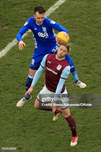 Carl Jenkinson of Birmingham battles with Birkir Bjarnason of Villa during the Sky Bet Championship match between Aston Villa and Birmingham City at...