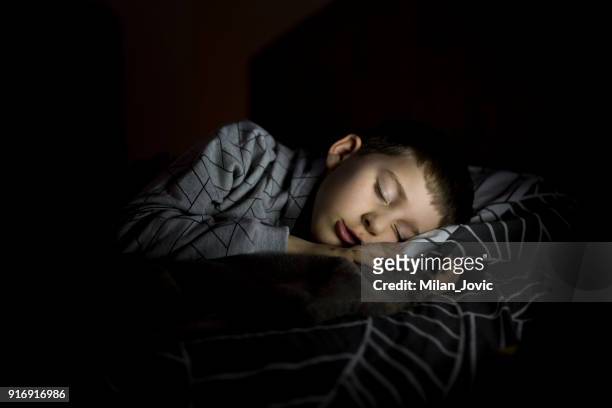 sleepy time - child asleep in bedroom at night stock pictures, royalty-free photos & images