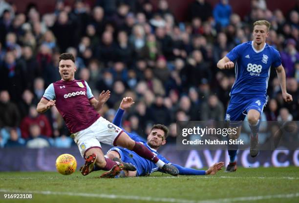 Scott Hogan of Aston Villa goes looking for a penalty after Harlee Dean of Birmingham City dives in during the Sky Bet Championship match between...
