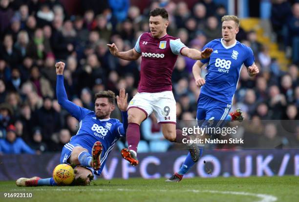Scott Hogan of Aston Villa and Harlee Dean of Birmingham City in action during the Sky Bet Championship match between Aston Villa and Birmingham City...