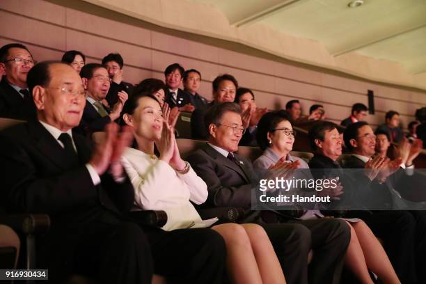 In this handout image provided by the South Korean Presidential Blue House, South Korean President Moon Jae-in watches a performance of North Korea's...