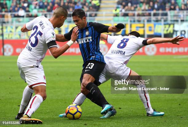 Eder of FC Internazionale competes for the ball with Adam Masina and Riccardo Orsolini of Bologna FC during the serie A match between FC...