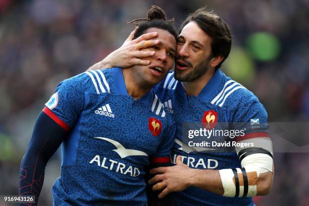 Teddy Thomas of France celebrates with teammate Remi Lamerat after scoring his sides first try during the NatWest Six Nations match between Scotland...